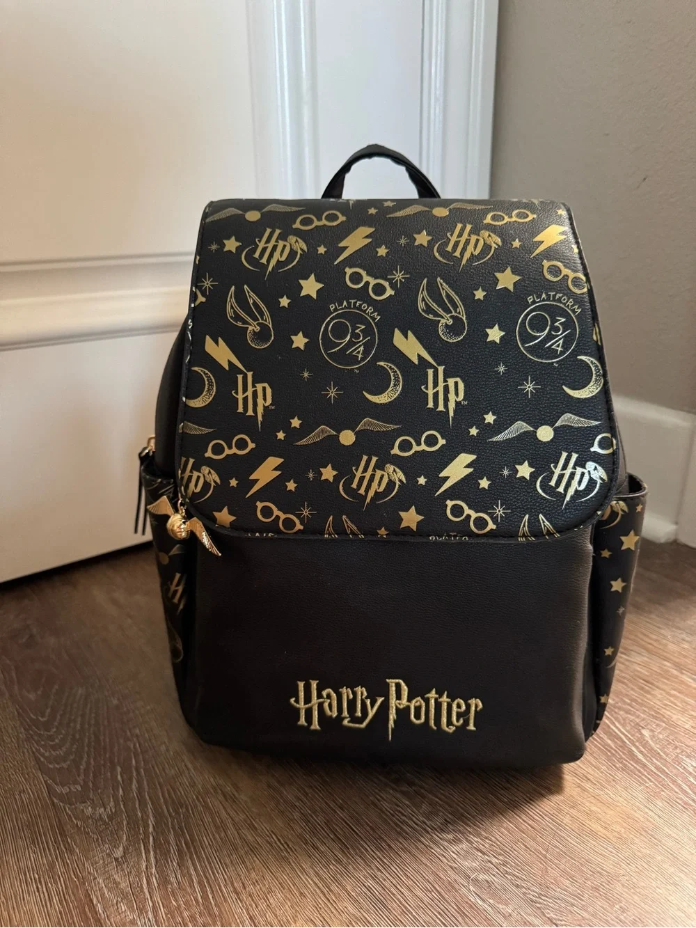 Warner Bros. Harry Potter Black & Gold Emblem Backpack
